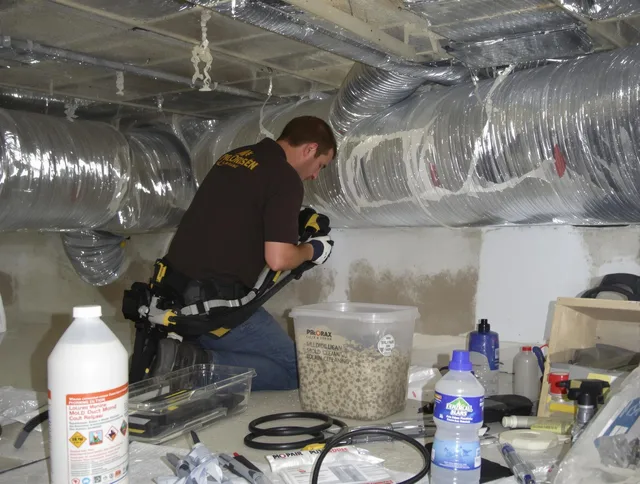 East Bridgewater Air Duct Cleaning specialist performing professional mold removal from air ducts in East Bridgewater