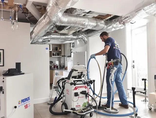East Bridgewater Air Duct Cleaning technician performing advanced pure duct cleaning with specialized equipment in East Bridgewater